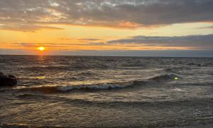 A sunset of at Norton Shore, Lake Michigan. Norton Shores, Michigan. Recreation. Jasmine Mancuso