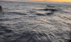 An April sunset on Lake Michigan. Norton Shores, Michigan. Recreation. Jasmine Mancuso